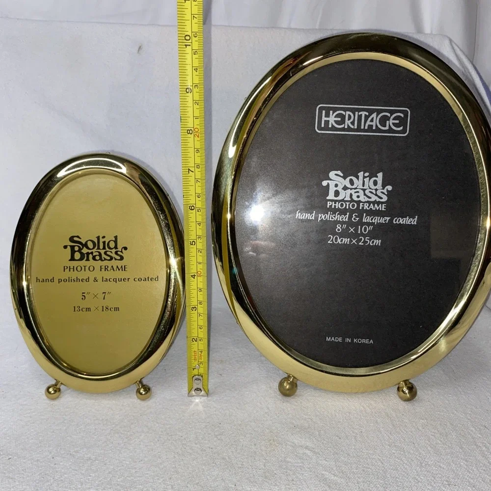 2 Solid Brass Oval Pictures Frames. One 5x7